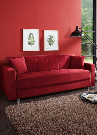 Klick-Klack-Sofa mit Dekokissen