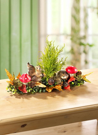 Tischaufleger mit herbstlichen Gräsern und Blättern