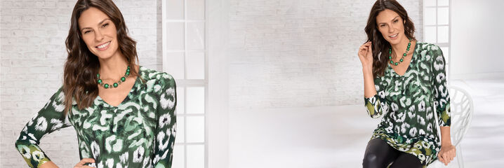 Dame mit grün-weisser Tunika und schwarzer Hose