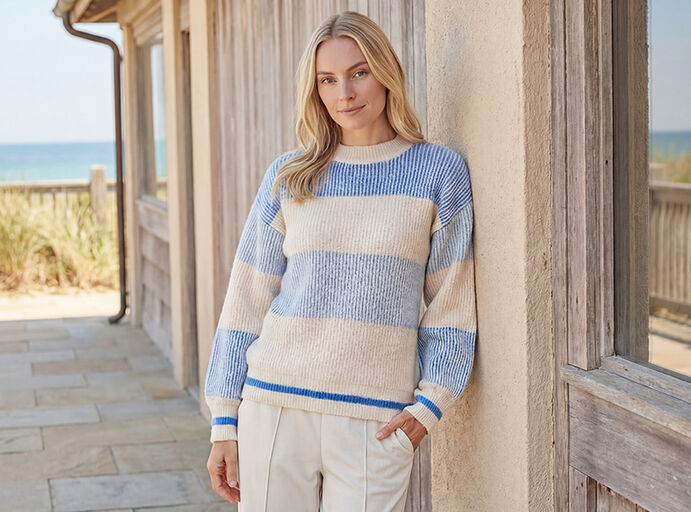 Dame in beigem Pullover