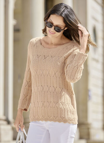 Pullover im Mustermix und mit Wellenabschlüssen 