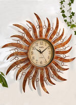 Wanduhr Sonne aus Metall 