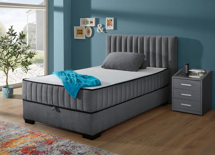 Boxspringbett mit Wendematratze und Bettkasten 