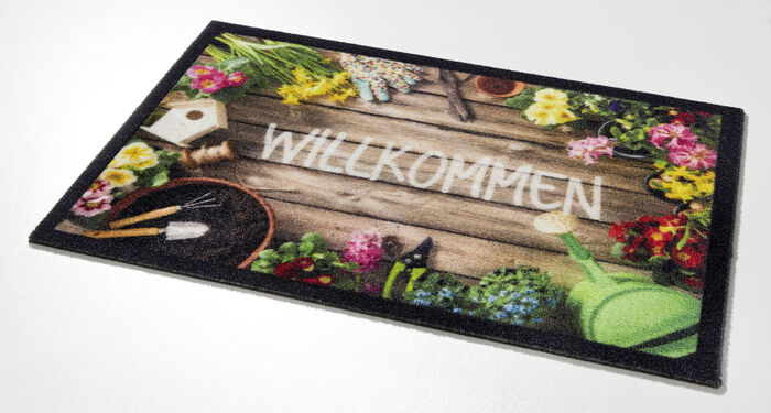 Fussmatte mit Willkommensgruß in pflegeleichte Qualität 
