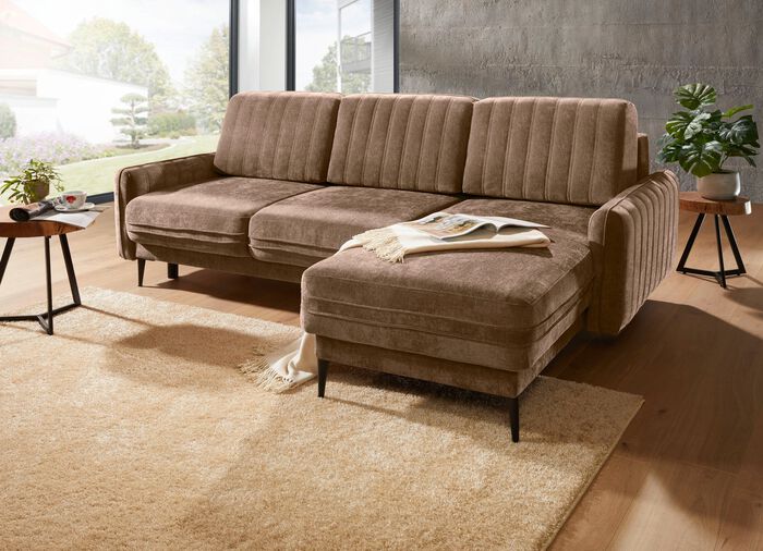 Polsterecke mit Bettfunktion und Bettkasten 