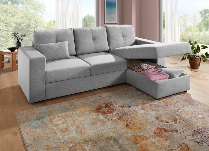 Frei im Raum aufstellbare Polsterecke mit Bettfunktion und Bettkasten 