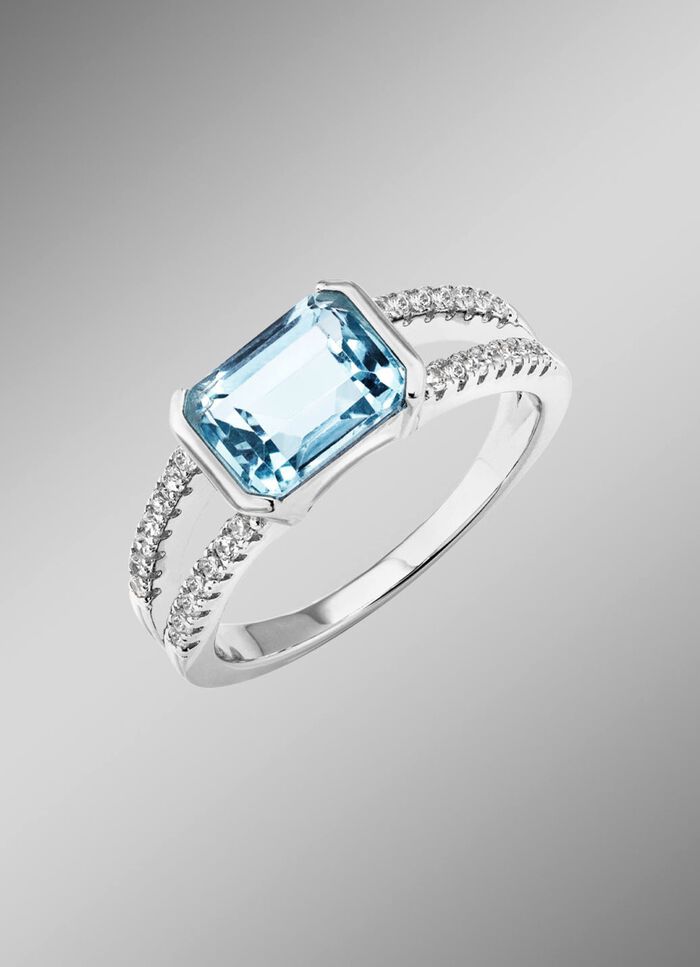 Eleganz trifft auf Zeitlosigkeit: Damenring mit Blautopas und synth. Zirkonia 